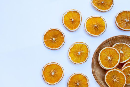 Dried orange slices on white background.