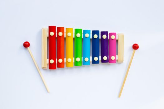 Colorful xylophone on white background.