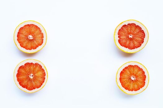 High vitamin C. Juicy grapefruit on white background.