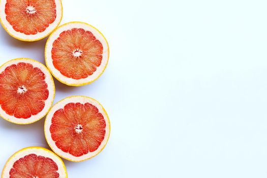 High vitamin C. Juicy grapefruit on white background.