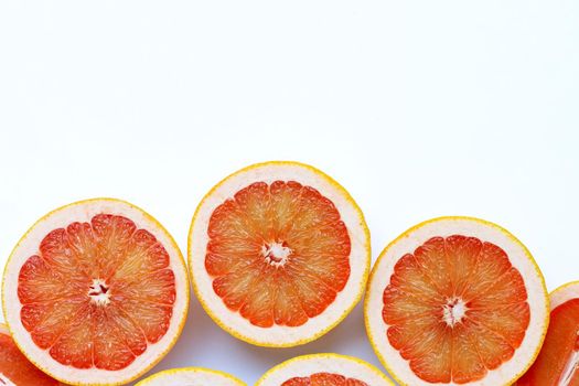 High vitamin C. Juicy grapefruit on white background.