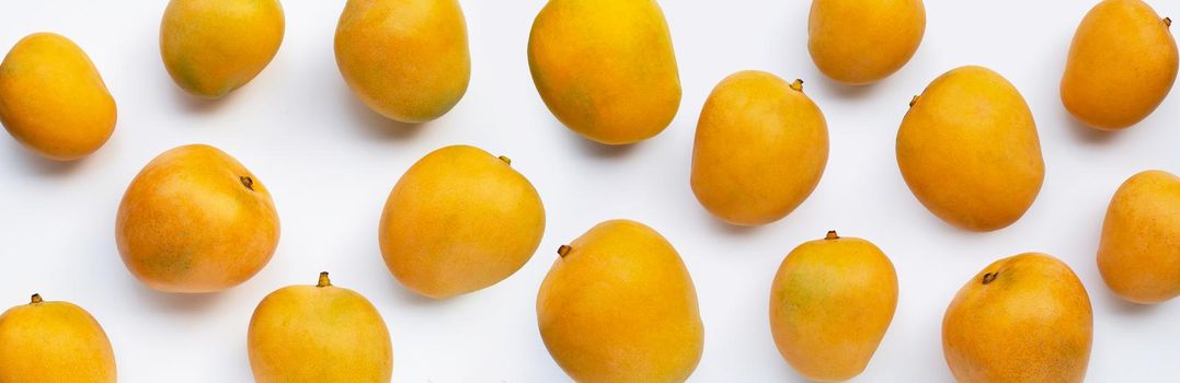 Tropical fruit, Mango on white background. Top view