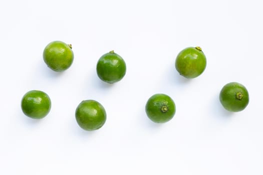 Fresh limes isolated on white background.