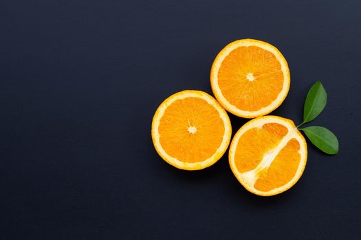 High vitamin C, Juicy and sweet. Fresh orange fruit on dark background.