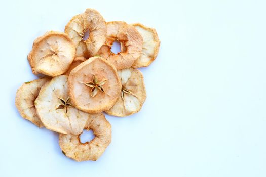 Dried apple slices on white background