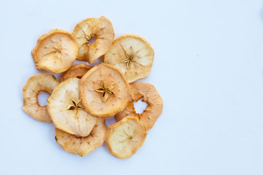 Dried apple slices on white background