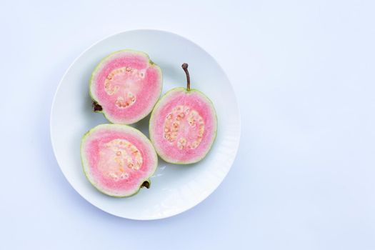 Pink guava on white background.
