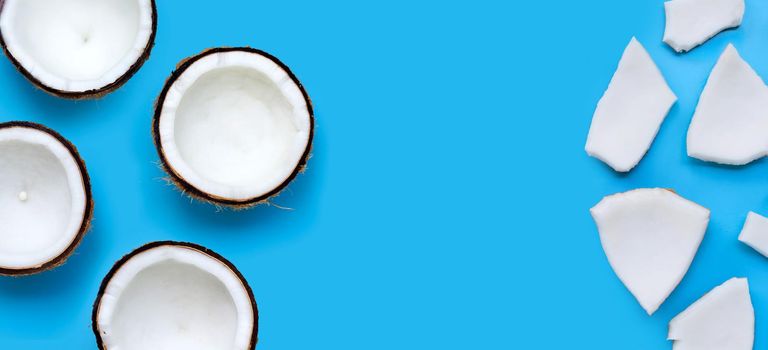 Coconuts on blue background. Top View