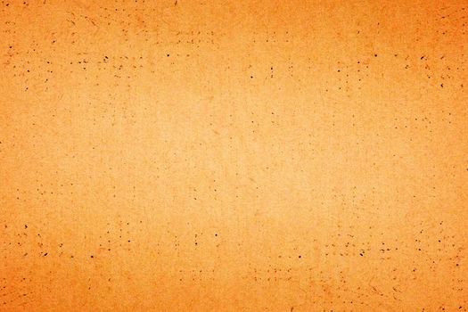 Sheet of brown paper texture for background.