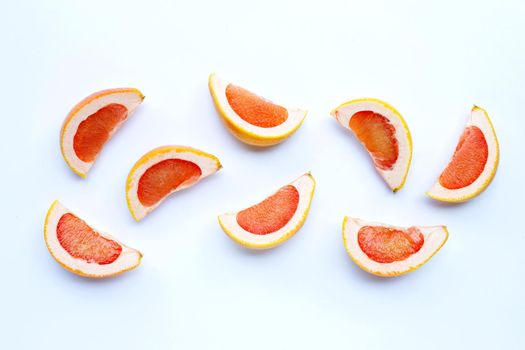 High vitamin C. Juicy grapefruit slices on white background.