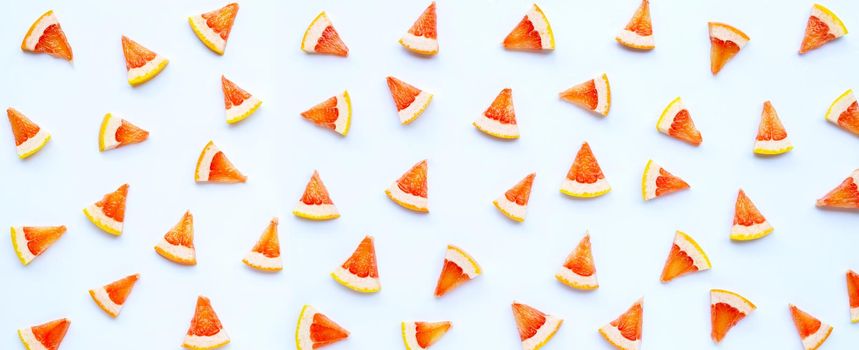 High vitamin C. Juicy grapefruit slices on white background.