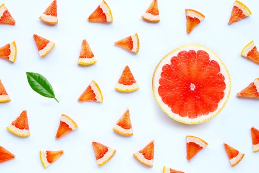 High vitamin C. Juicy grapefruit slices on white background.