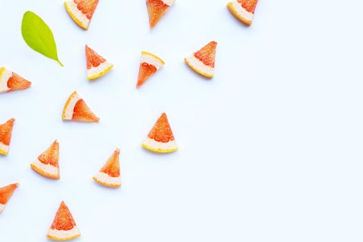 High vitamin C. Juicy grapefruit slices on white background.