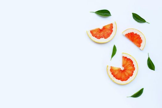 High vitamin C. Juicy grapefruit slices on white background.