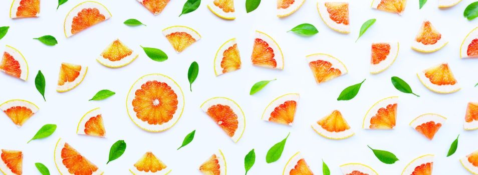 High vitamin C. Juicy grapefruit slices on white background.