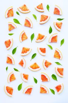 High vitamin C. Juicy grapefruit slices on white background.