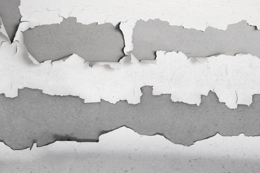 White color paint peeling off on ceiling house. Under the roof