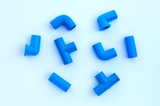 Blue pvc pipe connection isolated on white background.
