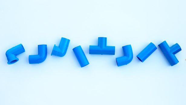 Blue pvc pipe connection isolated on white background.