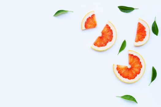 High vitamin C. Juicy grapefruit slices on white background.