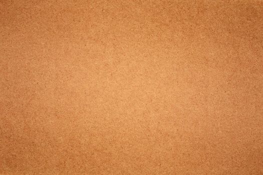 Sheet of brown paper texture for background.