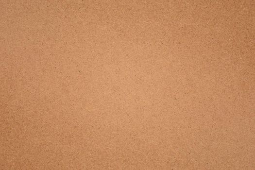 Sheet of brown paper texture for background.