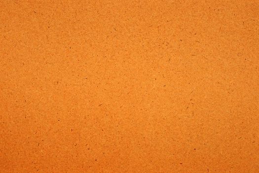 Sheet of brown paper texture for background.