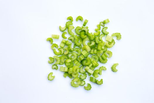 Fresh celery slices on white background. 