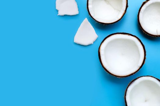 Coconuts on blue background. Top View