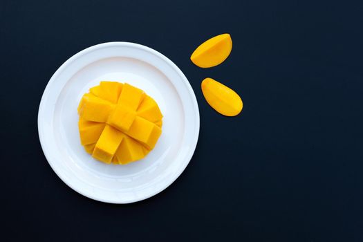 Tropical fruit, Mango  on dark background.
