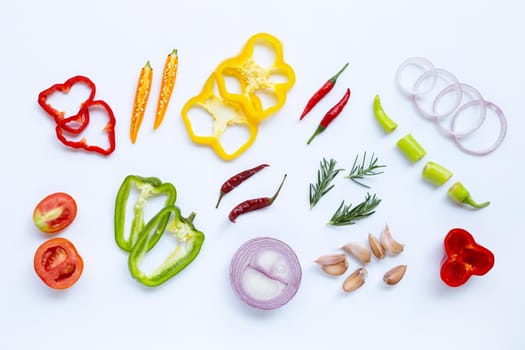 Various fresh vegetables and herbs on white background. Healthy eating concept