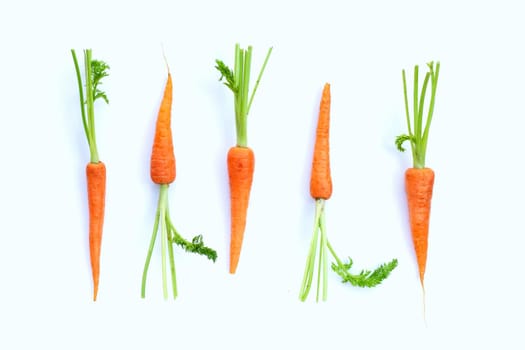 Fresh carrots on white background.