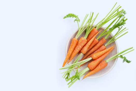 Fresh carrots on white background.