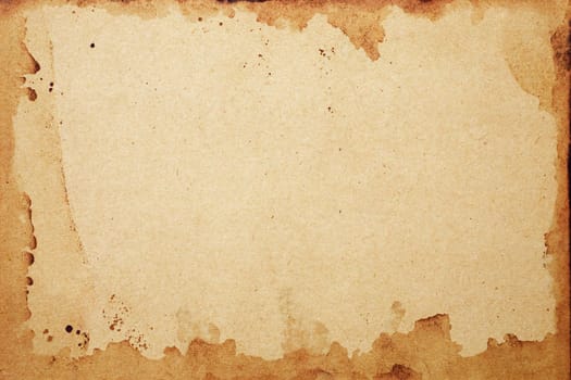 Old brown paper grunge background. Abstract frame liquid coffee color texture.