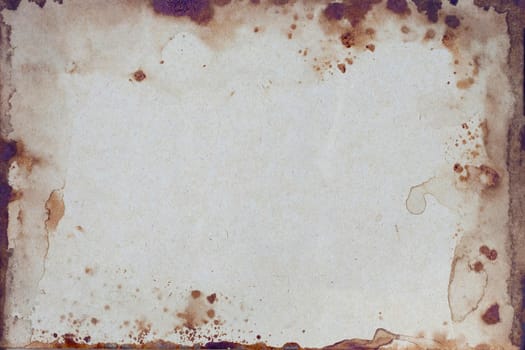 Old brown paper grunge background. Abstract liquid coffee color texture.