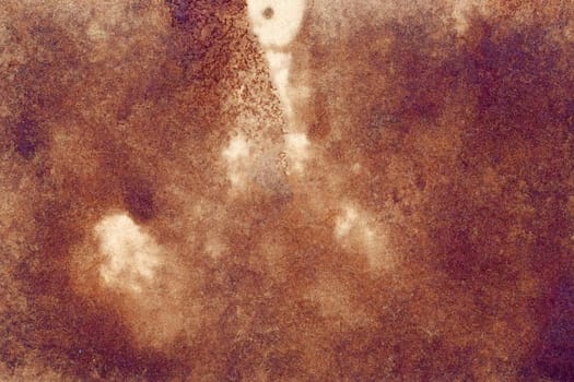 Old brown paper grunge background. Abstract liquid coffee color texture.
