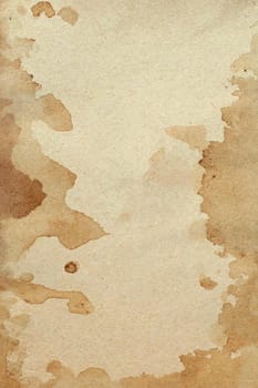 Old brown paper grunge background. Abstract liquid coffee color texture.