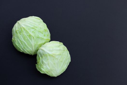 Cabbage on dark background. Copy space