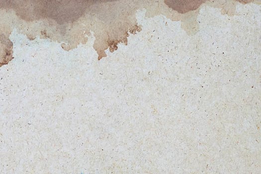 Old brown paper grunge background. Abstract liquid coffee color texture.