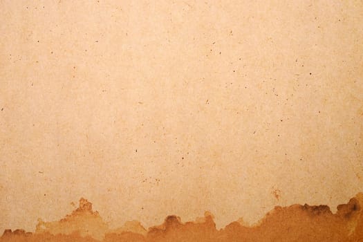 Old brown paper grunge background. Abstract liquid coffee color texture.