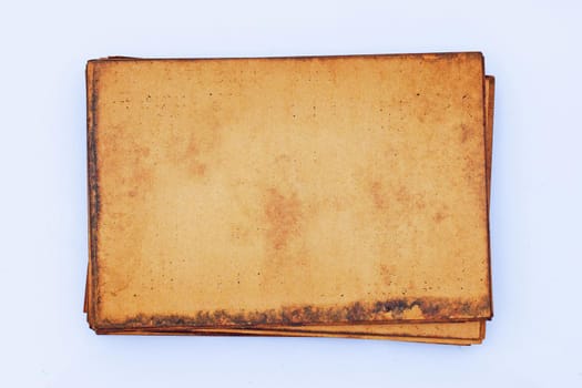 Old brown paper grunge background. Abstract liquid coffee color texture.