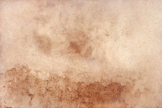 Old brown paper grunge background. Abstract liquid coffee color texture.