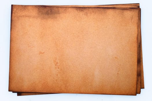 Old brown paper grunge background. Abstract liquid coffee color texture.