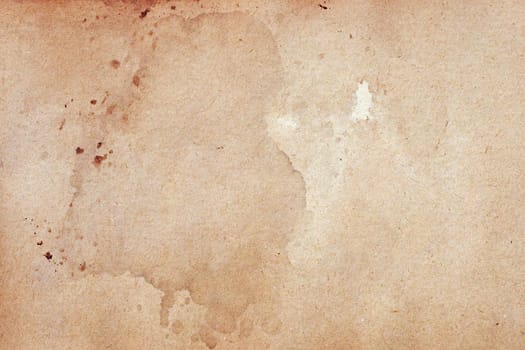 Old brown paper grunge background. Abstract liquid coffee color texture.