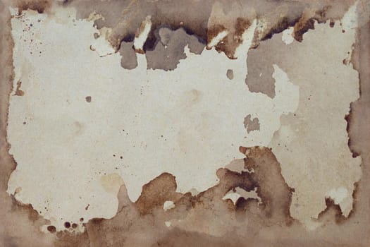 Old brown paper grunge background. Abstract liquid coffee color texture.