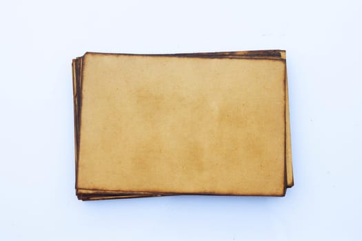 Old brown paper grunge background. Abstract liquid coffee color texture.