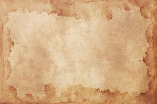 Old brown paper grunge background. Abstract liquid coffee color texture.