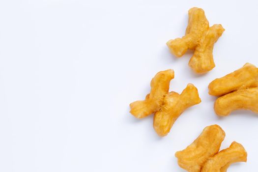 Deep-fried dough stick, chinese bread stick on white background with copy space