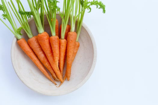 Fresh carrots on white background.