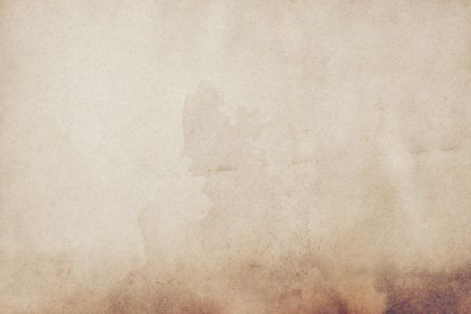 Old brown paper grunge background. Abstract liquid coffee color texture.